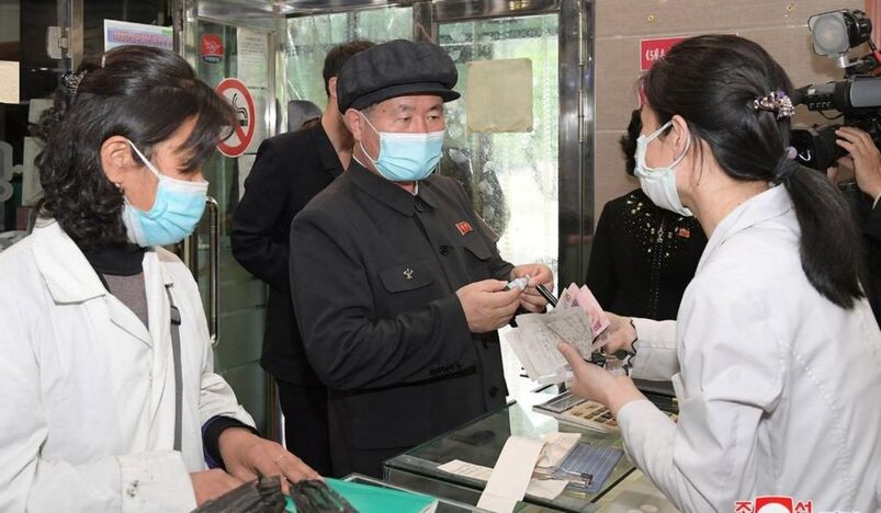 inspects a pharmacy amid the coronavirus disease